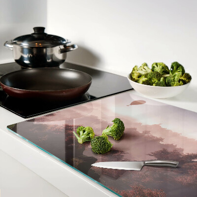 Glazen snijplanken Een heteluchtballon boven het landschap