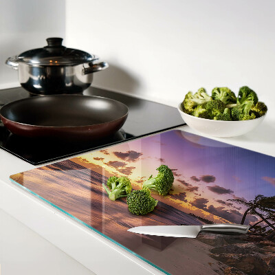 Snijplanken glas Zonsondergang boven het strand