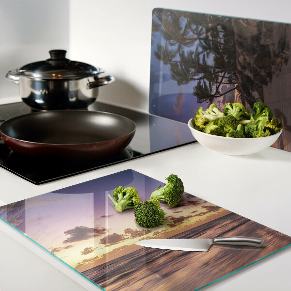 Snijplanken glas Zonsondergang boven het strand