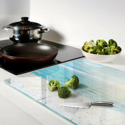 Snijplanken van glas De zee en de houten steiger