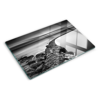Glazen snijplanken Een kustlandschap in grijstinten