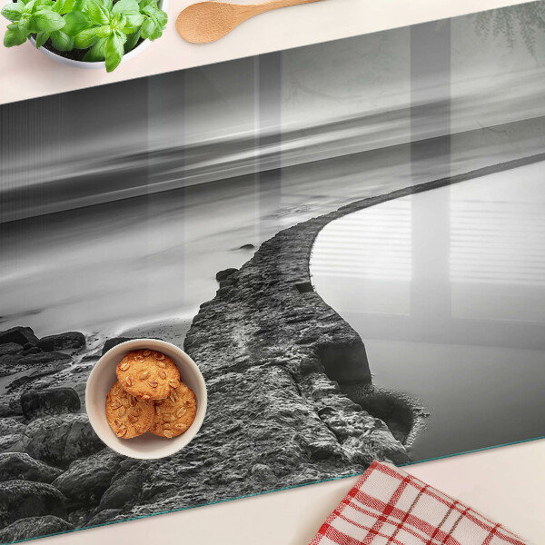 Glazen snijplanken Een kustlandschap in grijstinten