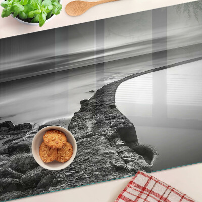 Glazen snijplanken Een kustlandschap in grijstinten