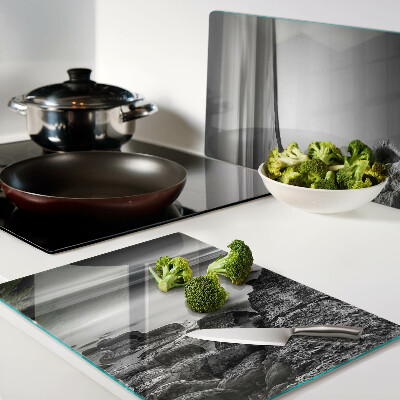 Glazen snijplanken Een kustlandschap in grijstinten