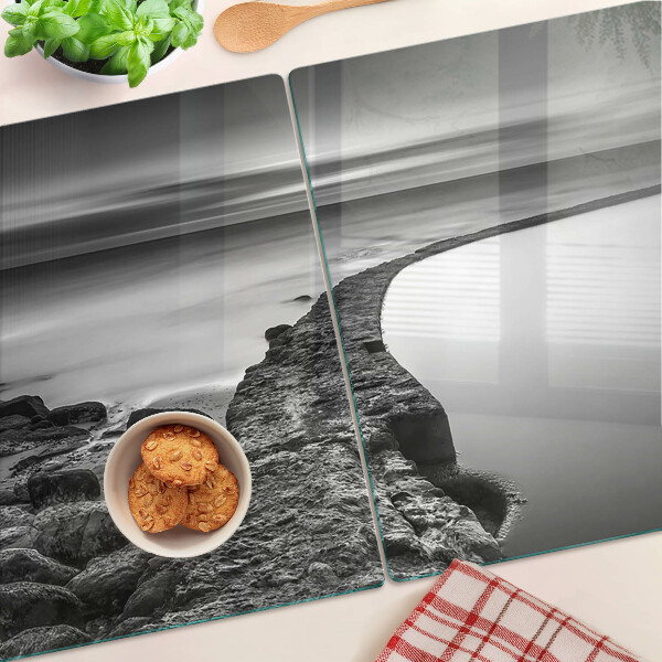 Glazen snijplanken Een kustlandschap in grijstinten