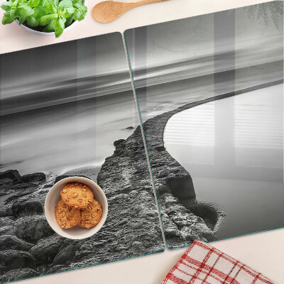 Glazen snijplanken Een kustlandschap in grijstinten