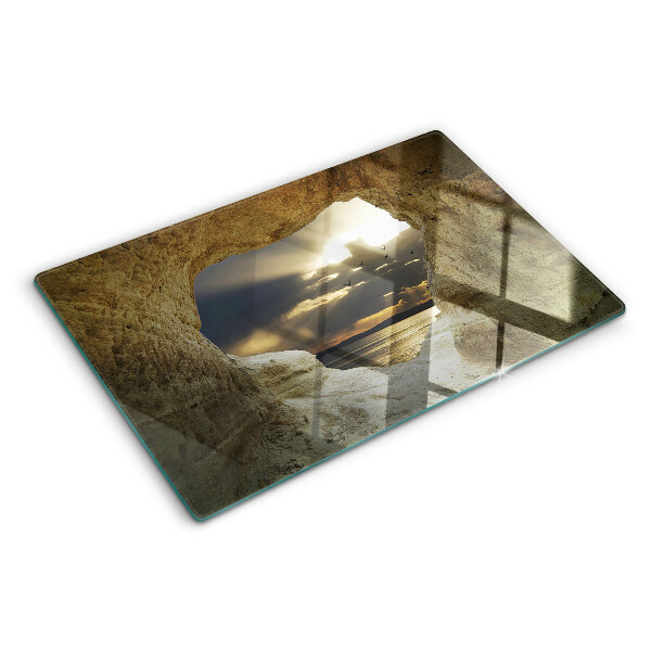 Snijplanken glas Uitzicht op de zee door de grot.