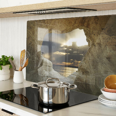 Snijplanken glas Uitzicht op de zee door de grot.