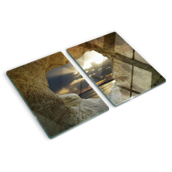 Snijplanken glas Uitzicht op de zee door de grot.