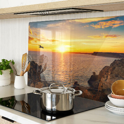 Snijplanken van glas Zonsondergang boven de zee