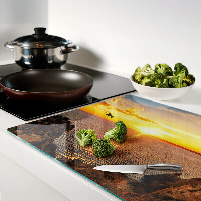 Snijplanken van glas Zonsondergang boven de zee