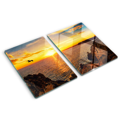 Snijplanken van glas Zonsondergang boven de zee