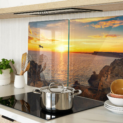 Snijplanken van glas Zonsondergang boven de zee