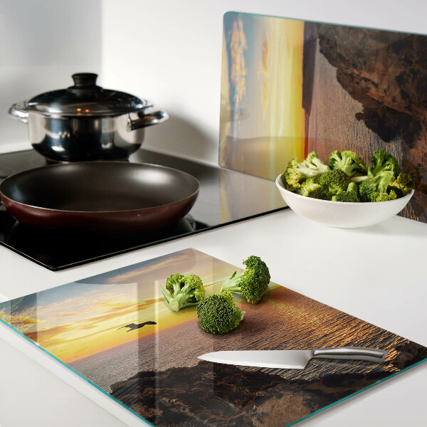 Snijplanken van glas Zonsondergang boven de zee