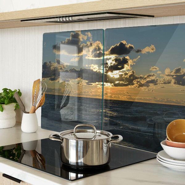 Snijplanken van glas Zonsondergang boven de zee