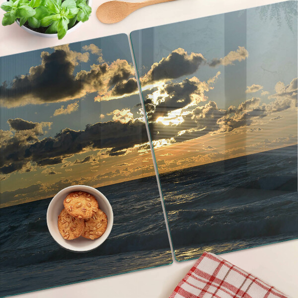 Snijplanken van glas Zonsondergang boven de zee
