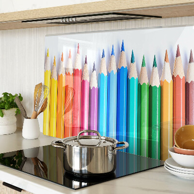Glazen snijplanken Gekleurde potloden op een rij