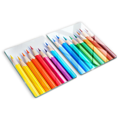 Glazen snijplanken Gekleurde potloden op een rij