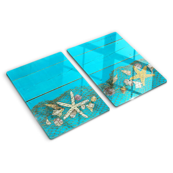 Snijplanken glas Schelpen en zeesterren in een net