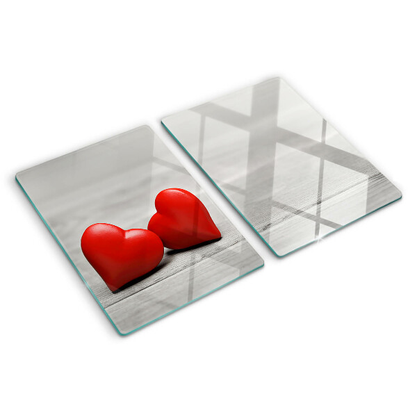 Snijplanken glas Rode harten op een houten achtergrond