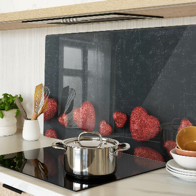 Glazen snijplanken Rode harten op een donkere achtergrond