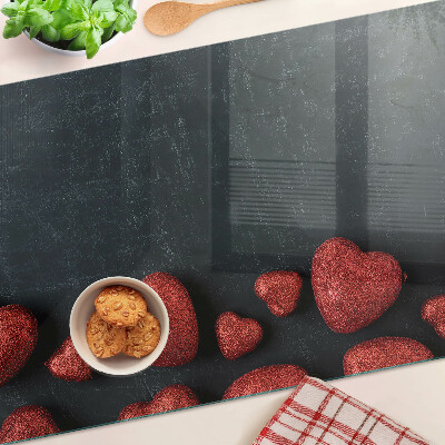 Glazen snijplanken Rode harten op een donkere achtergrond