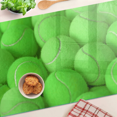 Snijplanken glas Tennisballen op een groene achtergrond