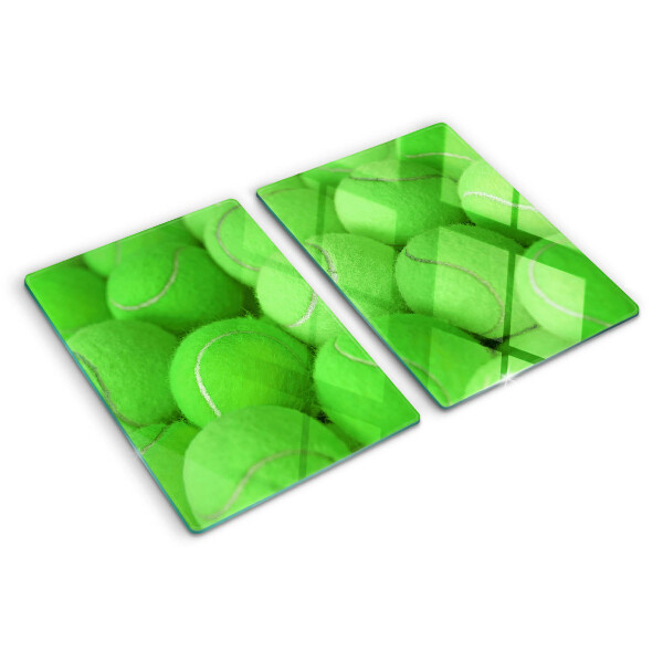 Snijplanken glas Tennisballen op een groene achtergrond