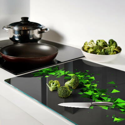 Snijplanken glas Groene driehoeken op een zwarte achtergrond