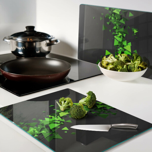 Snijplanken glas Groene driehoeken op een zwarte achtergrond