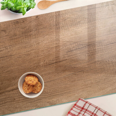 Snijplanken van glas Hout met weerspiegeling in het raam