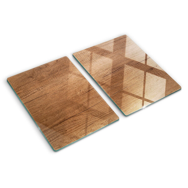 Snijplanken van glas Hout met weerspiegeling in het raam