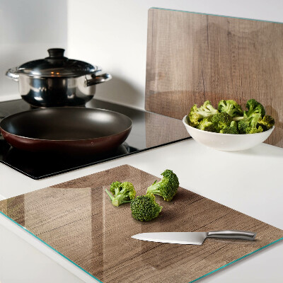 Snijplanken van glas Hout met weerspiegeling in het raam