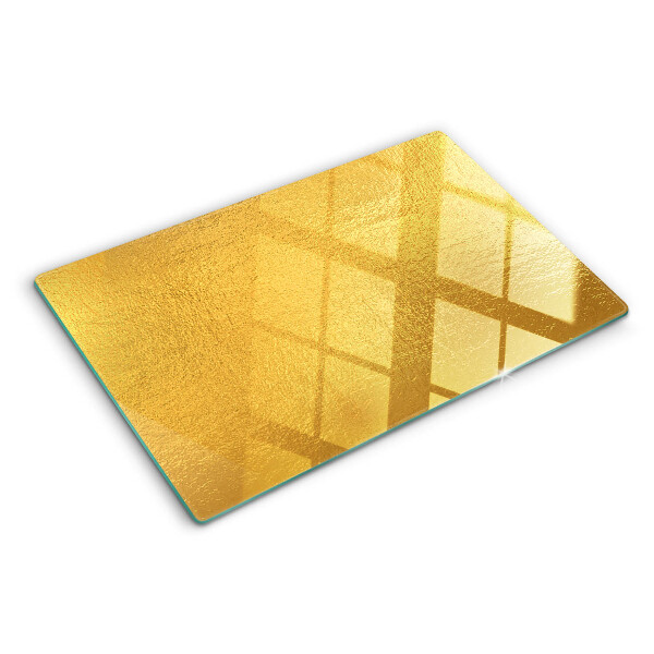 Snijplanken van glas Gouden oppervlak met reflecties