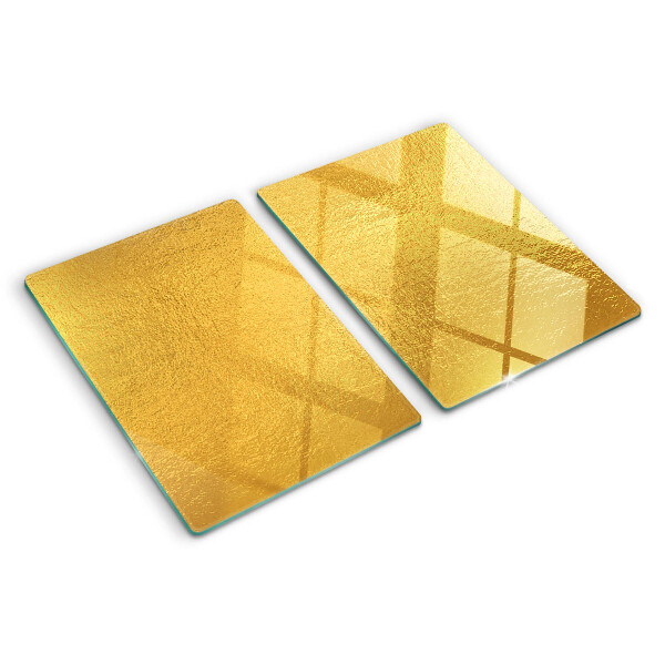Snijplanken van glas Gouden oppervlak met reflecties