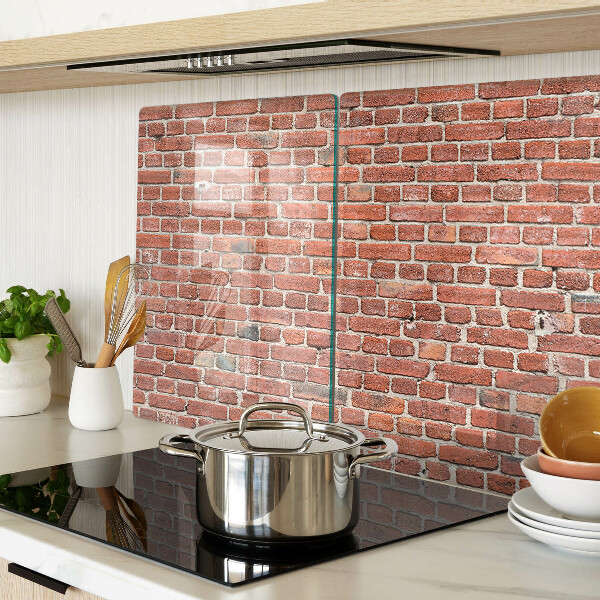 Snijplanken van glas Bakstenen muur