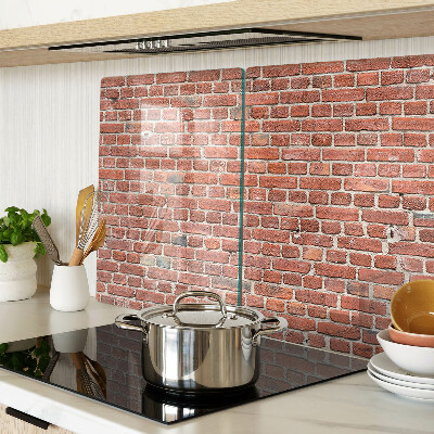 Snijplanken van glas Bakstenen muur
