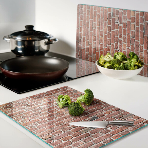 Snijplanken van glas Bakstenen muur