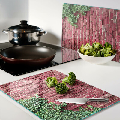 Glazen snijplanken Bakstenen muur met begroeiing