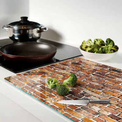 Snijplanken van glas Bakstenen muur