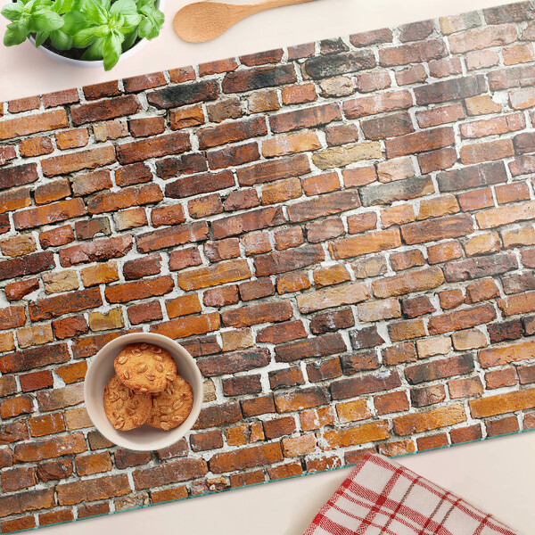 Snijplanken van glas Bakstenen muur