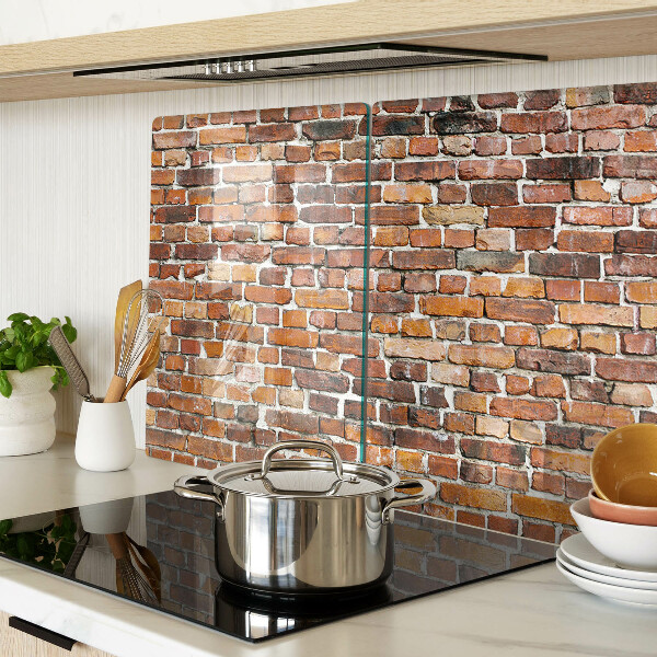 Snijplanken van glas Bakstenen muur