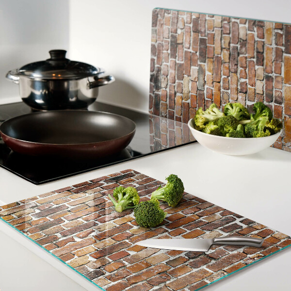 Snijplanken van glas Bakstenen muur