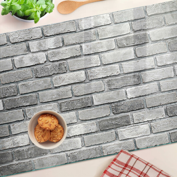 Snijplanken glas Bakstenen muur in grijstinten