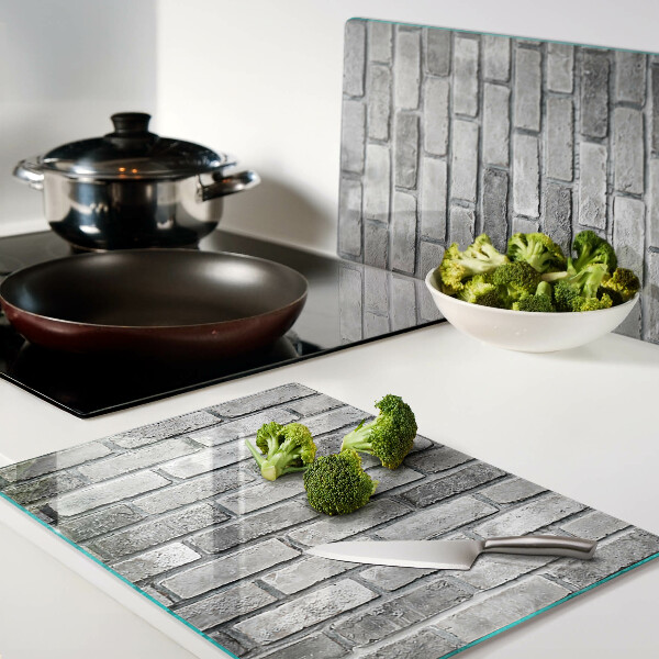 Snijplanken glas Bakstenen muur in grijstinten