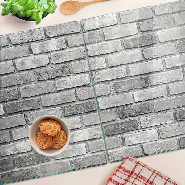 Snijplanken glas Bakstenen muur in grijstinten