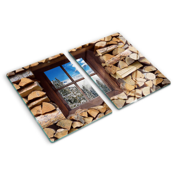 Snijplanken van glas Uitzicht op een winterlandschap door het raam.