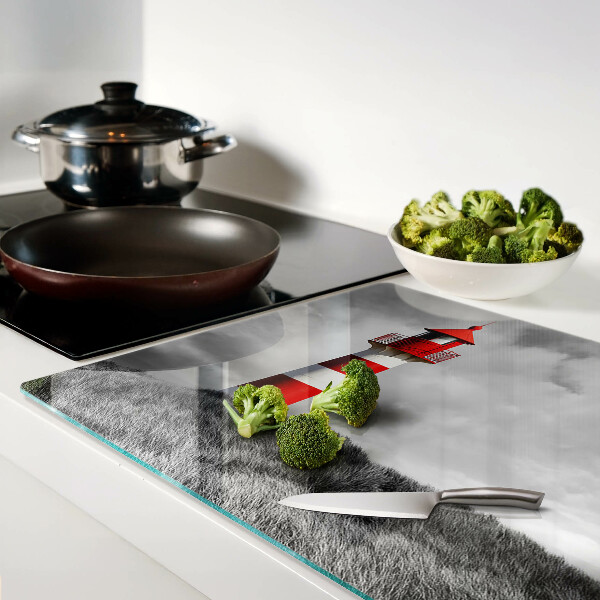 Snijplanken glas Een vuurtoren in het landschap