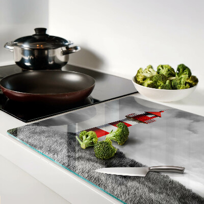 Snijplanken glas Een vuurtoren in het landschap