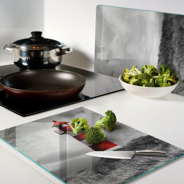 Snijplanken glas Een vuurtoren in het landschap